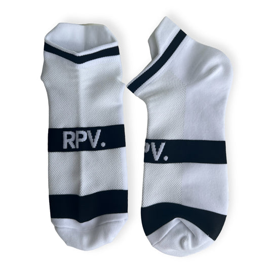 Unleash the power of speed with “The Velocity” from our RPV. Performance Range. These dynamic white compression socks are crafted for those who seek the thrill of maximum performance. Engineered with precision, “The Velocity” embodies the essence of speed and endurance.