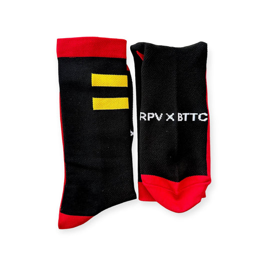 RPV x BTTC Collab | Our compression running socks are designed with the highest quality materials, including a blend of nylon, spandex, and polyester. This combination offers maximum durability and flexibility, ensuring that our socks can withstand even the toughest workouts.